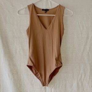Kendall and Kylie tan one piece body suit